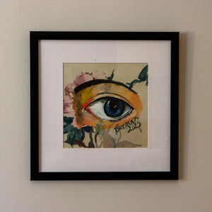 Eye over painted flowers